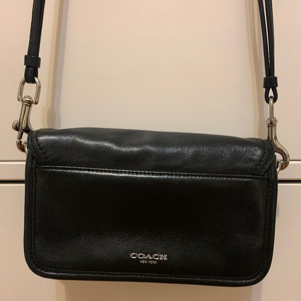 Coach black crossbody purse.